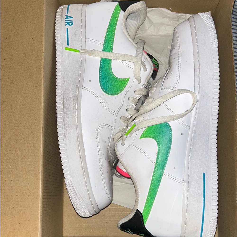 Nike White Sneakers with Green Swoosh and Blue Detail